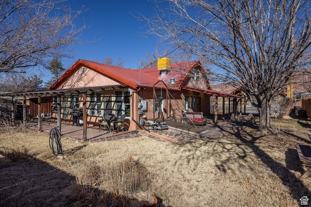 232 E 100 S, Moab, UT 84532 - rear view of property with a patio area