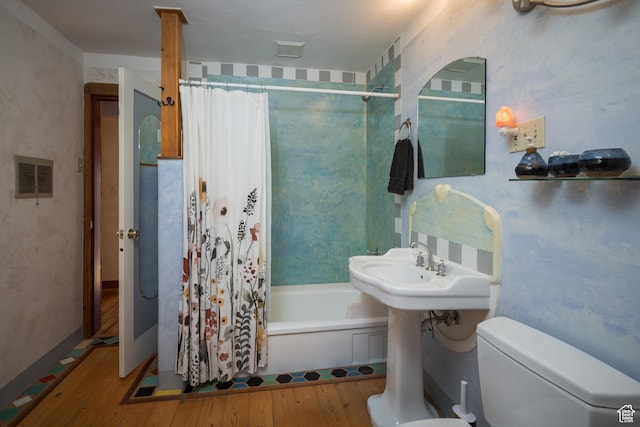 232 E 100 S, Moab, UT 84532 - bathroom with toilet, shower / tub combo, and hardwood / wood-style floors