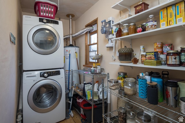 232 E 100 S, Moab, UT 84532 - laundry area featuring gas water heater and stacked washer / dryer