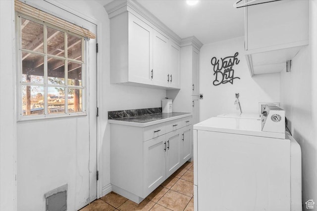 180 W 300 S, Fillmore, UT 84631 - laundry area with light tile patterned flooring, cabinets, and washing machine and dryer
