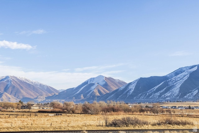 mountain view featuring a rural view
