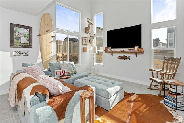 1088 N Freeman Dr, Saratoga Springs, UT 84045 - carpeted living area with a healthy amount of sunlight and baseboards