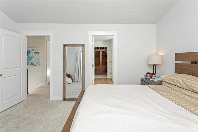 1088 N Freeman Dr, Saratoga Springs, UT 84045 - bedroom featuring light colored carpet, baseboards, and visible vents
