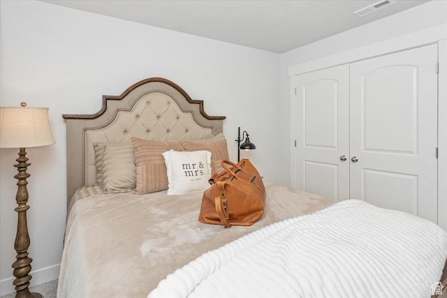 1088 N Freeman Dr, Saratoga Springs, UT 84045 - carpeted bedroom featuring baseboards, visible vents, and a closet