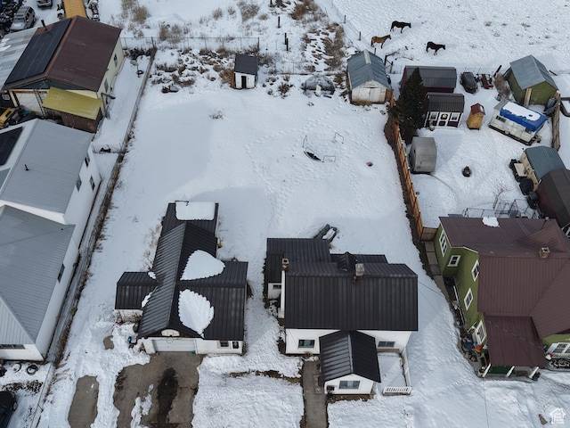 353 S 9th St, Montpelier, ID 83254 - snowy aerial view with a residential view
