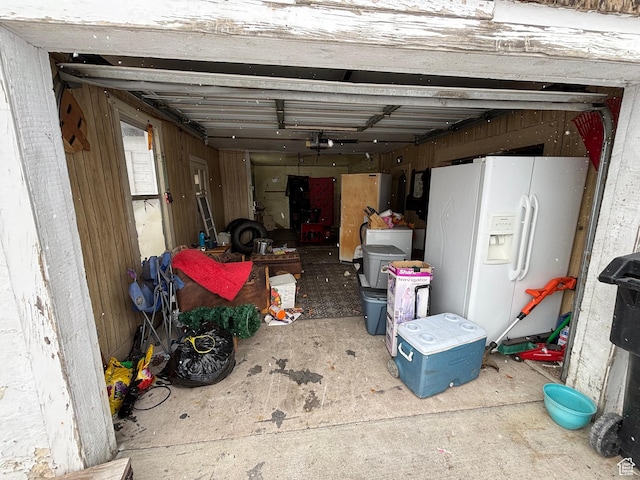 353 S 9th St, Montpelier, ID 83254 - garage featuring white fridge with ice dispenser and refrigerator
