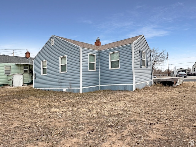 117 Grassy Dr, East Carbon, UT 84520 - view of side of property featuring a yard