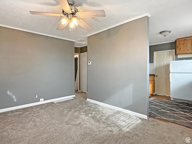 117 Grassy Dr, East Carbon, UT 84520 - carpeted empty room featuring crown molding, ceiling fan, and a textured ceiling