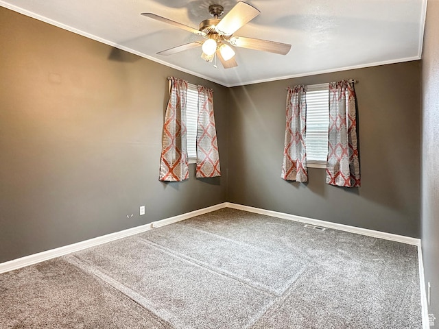 117 Grassy Dr, East Carbon, UT 84520 - unfurnished room with ceiling fan, ornamental molding, carpet flooring, and a wealth of natural light