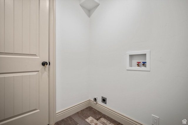 clothes washing area with electric dryer hookup, hookup for a washing machine, and hardwood / wood-style flooring