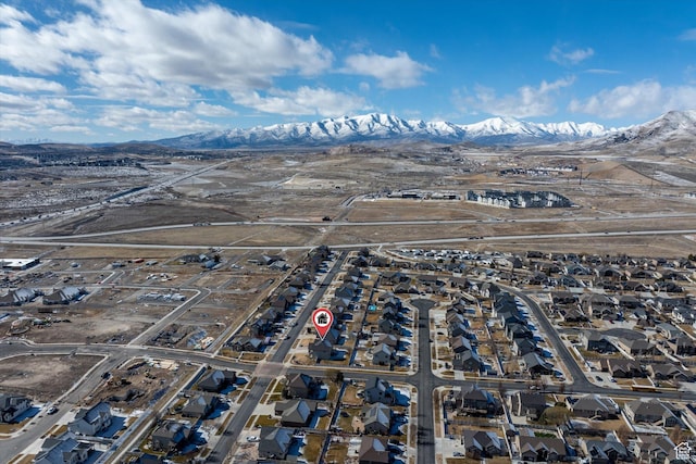 drone / aerial view featuring a mountain view