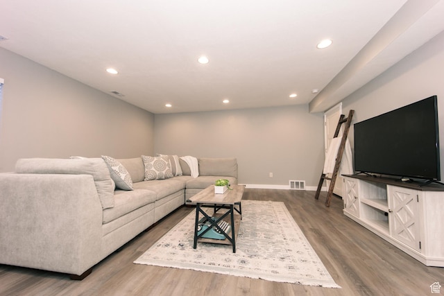 14368 S Penrhy Ct, Herriman, UT 84096 - living room with recessed lighting, wood finished floors, and baseboards