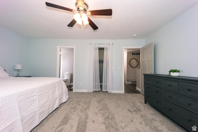 14368 S Penrhy Ct, Herriman, UT 84096 - carpeted bedroom featuring baseboards, a ceiling fan, and ensuite bathroom