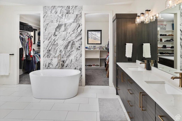 3450 N 1930 E, North Logan, UT 84341 - bathroom with a notable chandelier, vanity, tile patterned flooring, and a tub