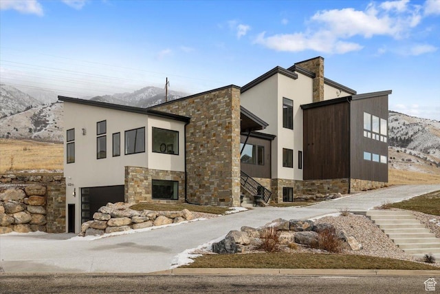 3450 N 1930 E, North Logan, UT 84341 - view of property featuring a garage and a mountain view