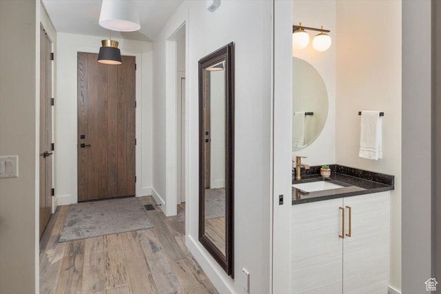 3450 N 1930 E, North Logan, UT 84341 - interior space featuring vanity and wood-type flooring