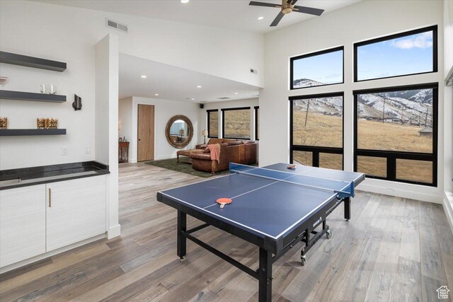 3450 N 1930 E, North Logan, UT 84341 - recreation room with ceiling fan, hardwood / wood-style floors, and a high ceiling