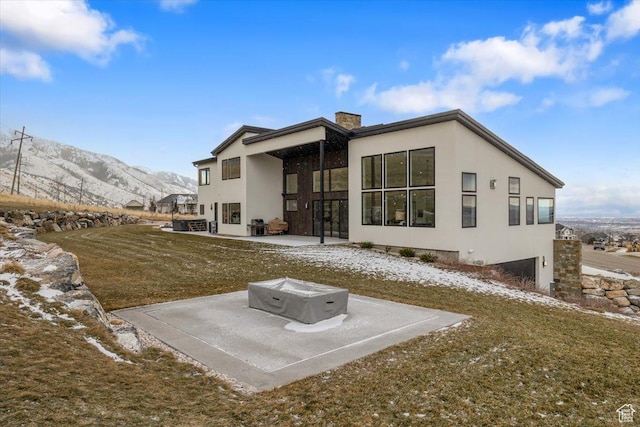 3450 N 1930 E, North Logan, UT 84341 - rear view of property featuring a mountain view, a patio area, and a lawn