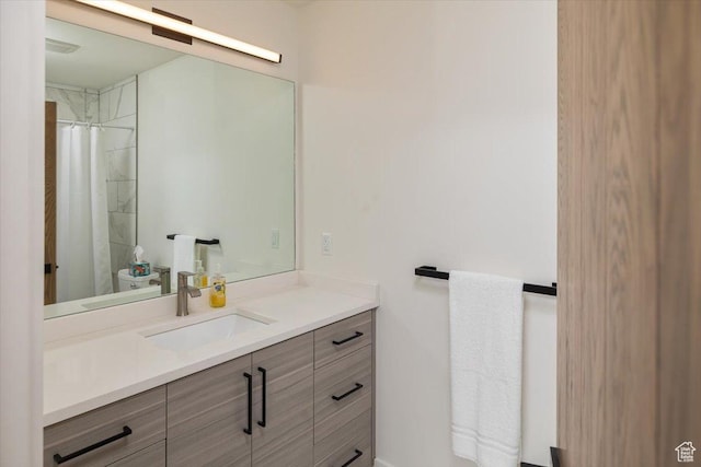 3450 N 1930 E, North Logan, UT 84341 - bathroom with vanity, toilet, and a shower with shower curtain
