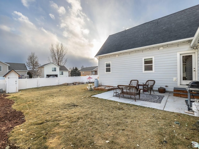 1802 E Magnolia Cir, Eagle Mountain, UT 84005 - rear view of house featuring a yard and a patio