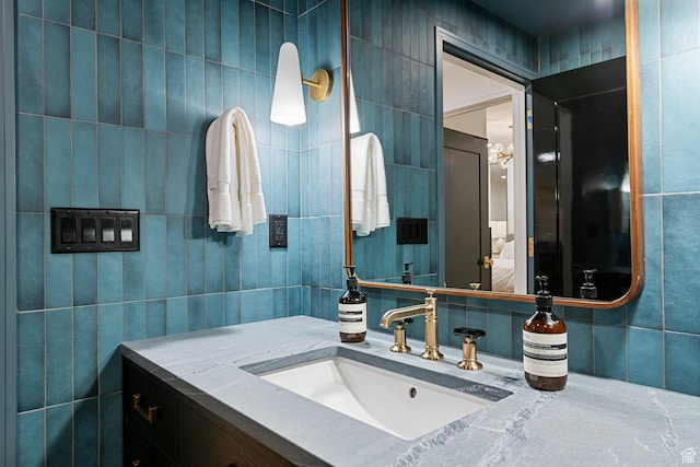 99 W S Temple St S Unit 2201, Salt Lake City, UT 84101 - bathroom with tile walls and vanity