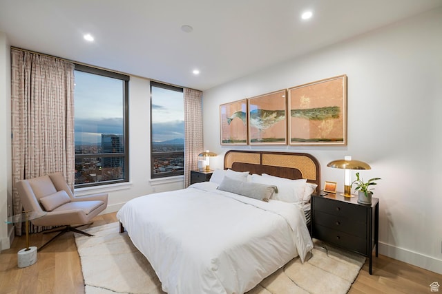 99 W S Temple St S Unit 2201, Salt Lake City, UT 84101 - bedroom featuring light hardwood / wood-style flooring