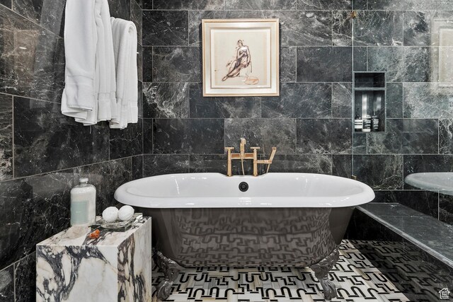 99 W S Temple St S Unit 2201, Salt Lake City, UT 84101 - bathroom with a tub and tile walls