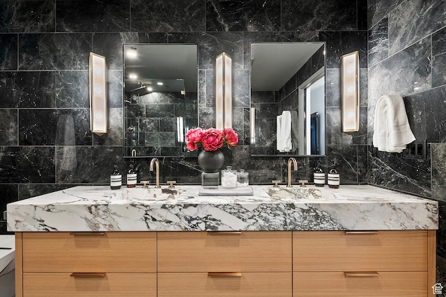 99 W S Temple St S Unit 2201, Salt Lake City, UT 84101 - bathroom featuring backsplash and vanity
