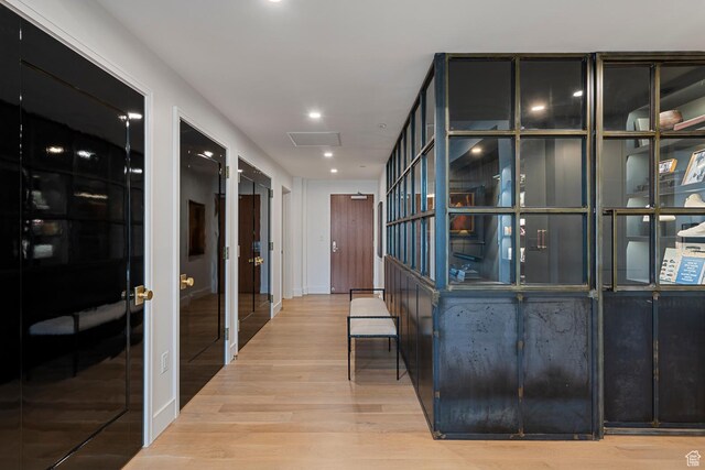 99 W S Temple St S Unit 2201, Salt Lake City, UT 84101 - corridor featuring light hardwood / wood-style flooring and french doors
