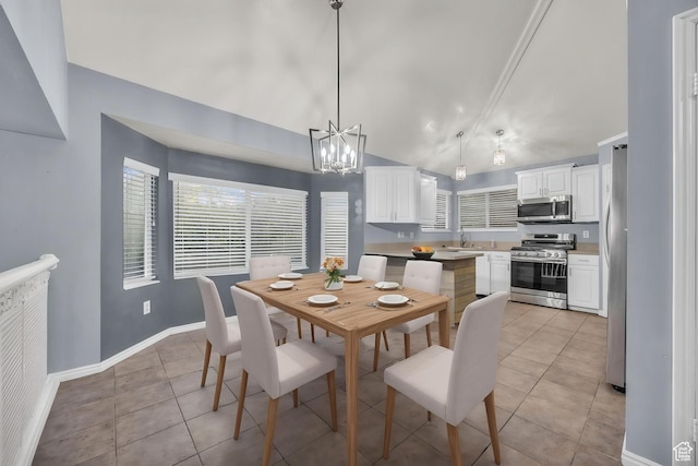 2152 E 3325 N, Layton, UT 84040 - dining space featuring light tile patterned floors, baseboards, vaulted ceiling, and a chandelier