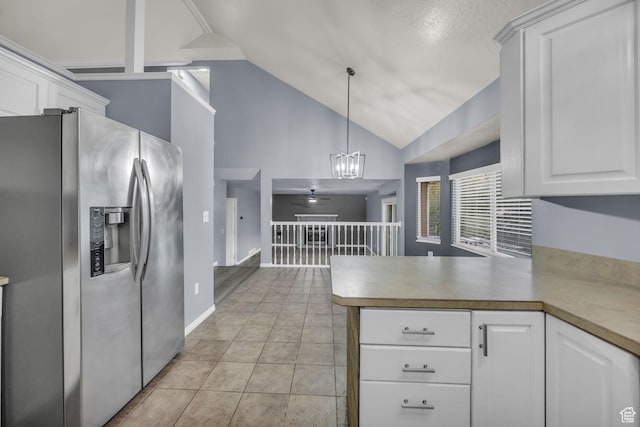2152 E 3325 N, Layton, UT 84040 - kitchen with an inviting chandelier, pendant lighting, a peninsula, stainless steel fridge, and white cabinets
