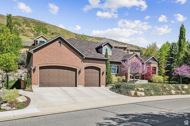 13299 S Laurel Park Ln, Draper, UT 84020 - view of front of home featuring brick siding, a garage, fence, and driveway