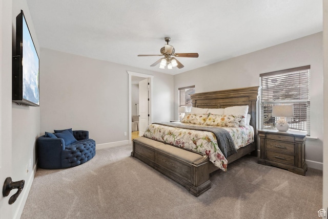 13299 S Laurel Park Ln, Draper, UT 84020 - carpeted bedroom featuring connected bathroom, baseboards, and ceiling fan