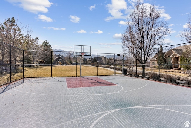 13299 S Laurel Park Ln, Draper, UT 84020 - view of sport court featuring community basketball court, fence, and a residential view