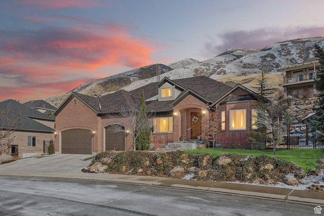 13299 S Laurel Park Ln, Draper, UT 84020 - view of front of property with brick siding, driveway, fence, and a mountain view
