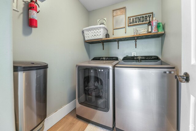 888 W Vahe St S, Draper, UT 84020 - laundry area with light wood-style flooring, baseboards, independent washer and dryer, and laundry area