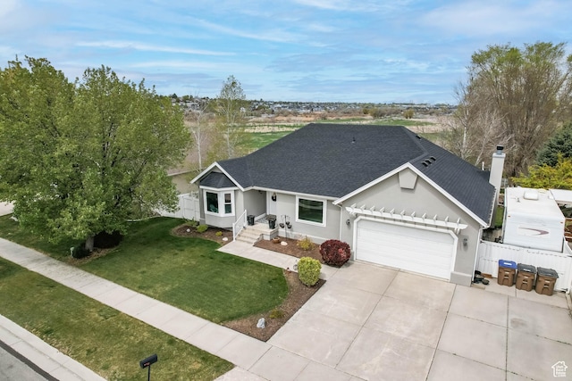 888 W Vahe St S, Draper, UT 84020 - ranch-style house featuring concrete driveway, a front lawn, a shingled roof, fence, and a garage