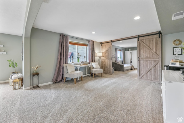 888 W Vahe St S, Draper, UT 84020 - living area featuring a barn door, carpet floors, visible vents, and recessed lighting