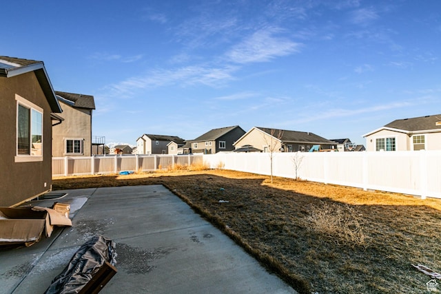 1038 W Regatta Ln, Stansbury Park, UT 84074 - view of yard featuring a patio area