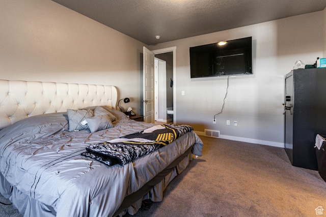1038 W Regatta Ln, Stansbury Park, UT 84074 - bedroom with black refrigerator, a textured ceiling, and carpet