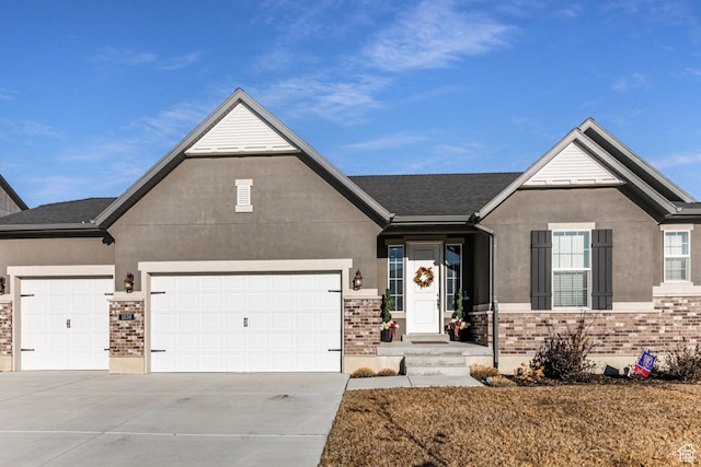 view of front of property with a garage