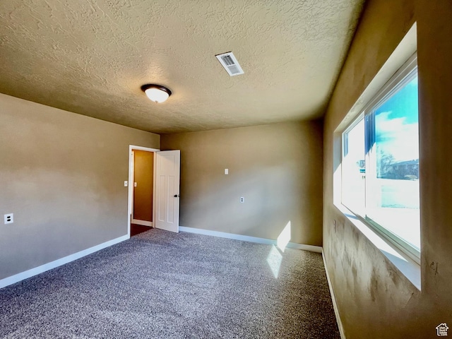 255 W Main St, Mount Pleasant, UT 84647 - unfurnished room with a textured ceiling and carpet flooring