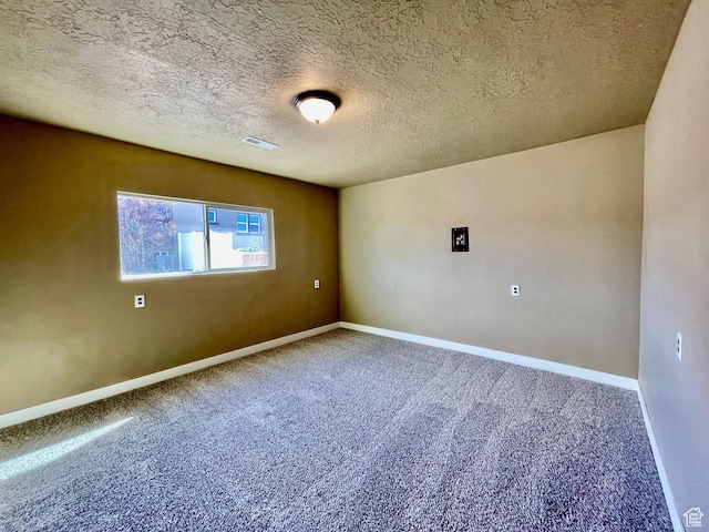 255 W Main St, Mount Pleasant, UT 84647 - unfurnished room with carpet flooring and a textured ceiling