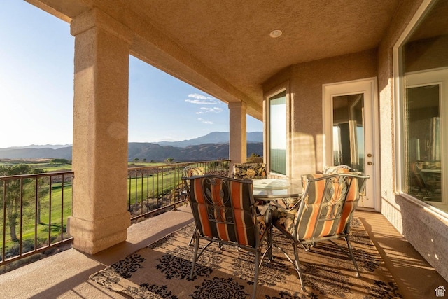 balcony featuring a mountain view