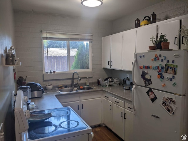 173 N K St E, Salt Lake City, UT 84103 - kitchen with white cabinetry, white appliances, dark hardwood / wood-style flooring, and sink