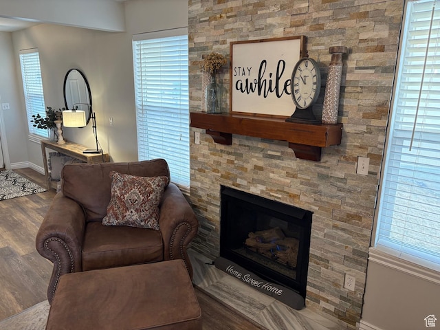 840 N Great View Dr E, Morgan, UT 84050 - living area with baseboards, wood finished floors, and a fireplace