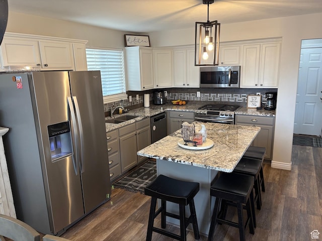 840 N Great View Dr E, Morgan, UT 84050 - kitchen with appliances with stainless steel finishes, a sink, dark wood-type flooring, and gray cabinetry
