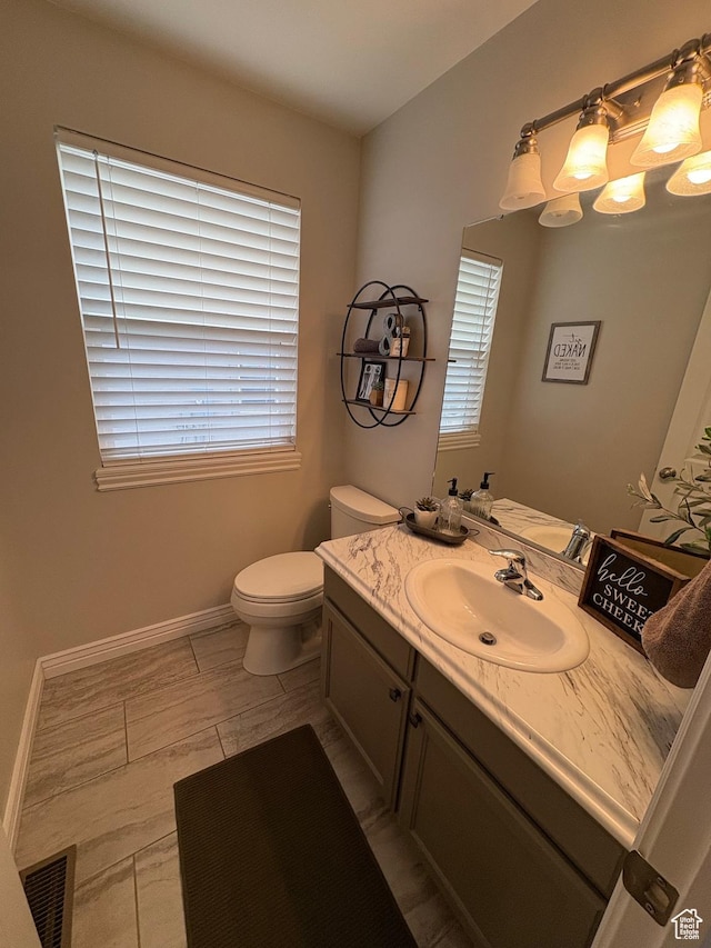 840 N Great View Dr E, Morgan, UT 84050 - half bath with healthy amount of natural light, toilet, vanity, and baseboards