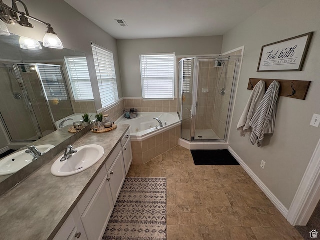 840 N Great View Dr E, Morgan, UT 84050 - full bathroom featuring a stall shower, vanity, a bath, and baseboards