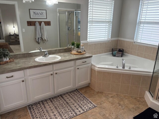 840 N Great View Dr E, Morgan, UT 84050 - full bathroom featuring a shower stall, a bath, vanity, and plenty of natural light